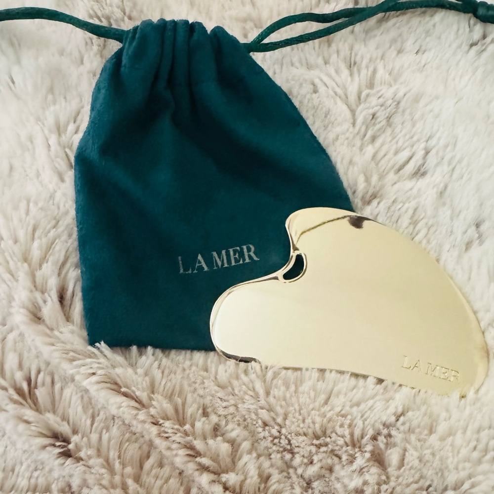 La Mer silver Beauty Tool with Teal Pouch